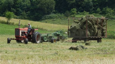 Baling Hay Is Hard Work Making Small Square Bales With John Deere