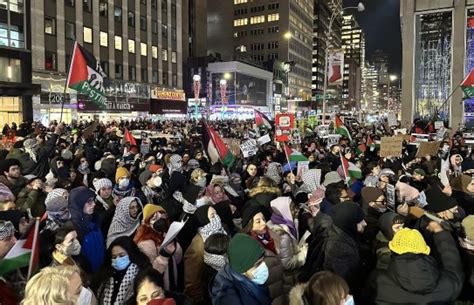 Thousands Protest Near Rockefeller Center Tree Lighting Ceremony