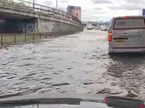Eight Rescued From Stranded Vehicles After Water Main Bursts On London
