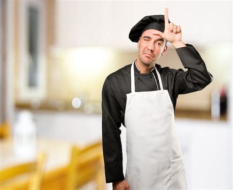 Premium Photo Loser Young Chef Posing