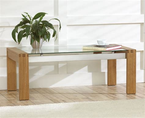 It's a unique, innovative piece that will help to transform your home into. Roma Solid Oak Coffee Table with Glass Top