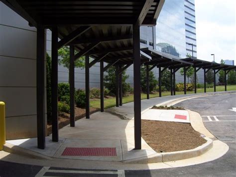 Our fabric style walkways and canopies provide an exciting aesthetic with essential coverage. Cantilevered Aluminum Canopies Gallery | Covered walkway ...
