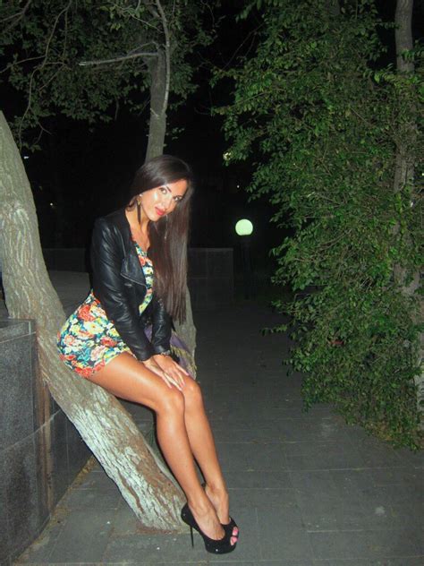 YouRateMe Slim Brunette With Long Legs Poses At Night