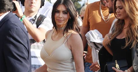 Kim Kardashian Takes Centre Stage In Skintight Nude As Husband Kanye