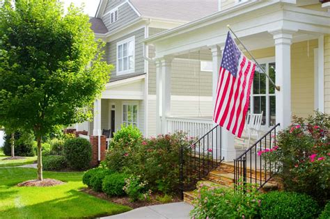 Show patriotism by displaying the american flag this 4th of july. Which Side Of Porch To Hang American Flag? - Home Decor Bliss