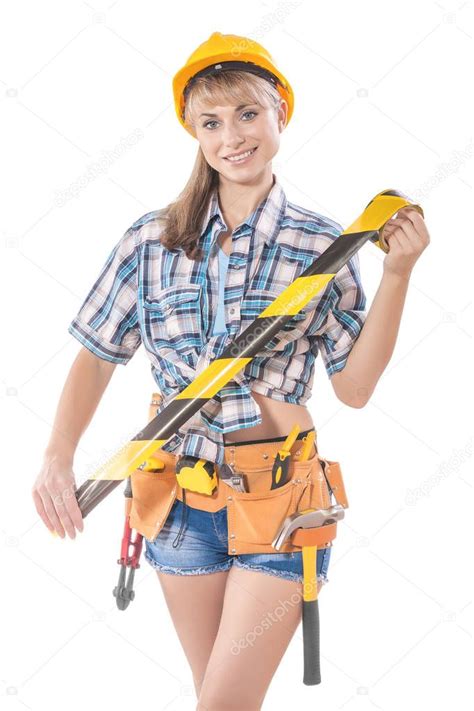 Beautyful Sexy Female Construction Worker Holding Caution Tape Stock