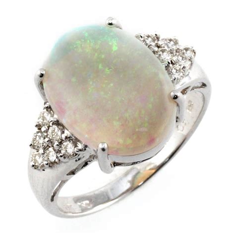 18ct White Gold Oval Opal And Diamond Ring From Mr Harold And Son