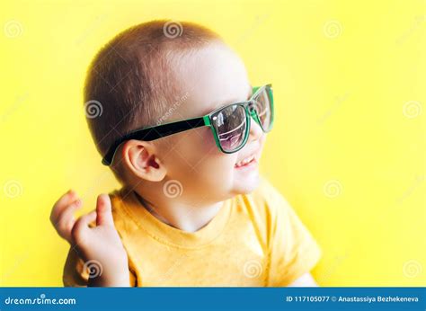 Baby Boy In Sunglasses On Yellow Background Stock Image Image Of