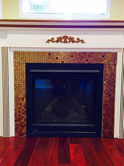 So here are some ideas for incorporating metallics such as copper, silver, gold and bronze, into your home. Metallic backsplash fireplace | Metallic backsplash ...