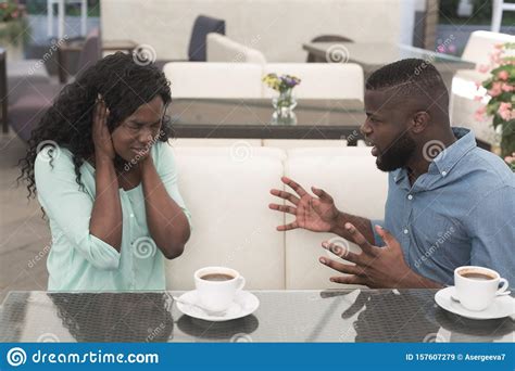 Young African Couple Arguing In A Cafe Relationship Problems Stock