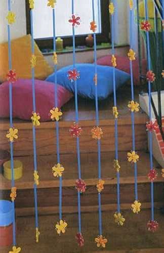 The Stairs Are Decorated With Colorful Flowers And Ribbons Hanging From