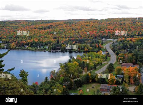 Lake Of Bays With Brilliant Autumn Foliage And Township Of Dorset At