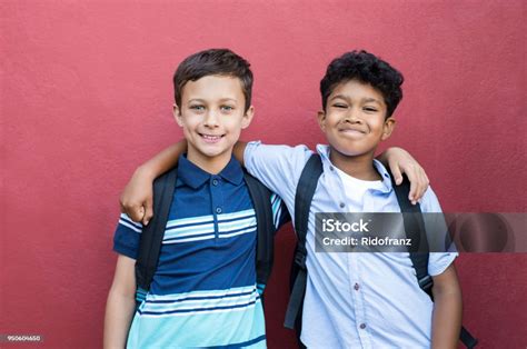 Smiling Children Friends Embracing Stock Photo Download Image Now