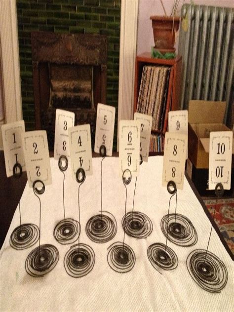 Sea shell silver place card holders. handmade table number holders | Handmade table numbers ...