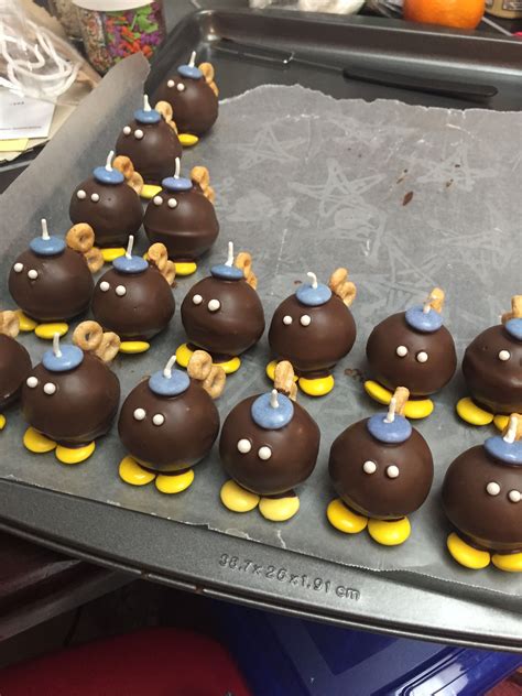 I am a mum of 2 little boys who both love chocolate and cake; Super Mario cake pop Bombs! | Super mario cake, Mario cake ...