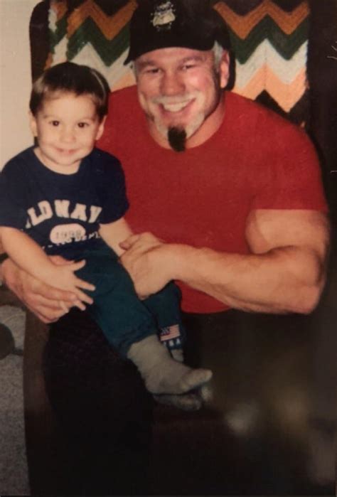 Baby Bronson Steiner Sitting On The Lap Of His Uncle Scott Steiner