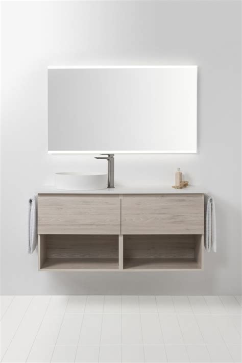 A vanity mirror with led or halogen light bulbs is preferable to one with integral led lights because larger bulbs produce more light, evenly distributed from this vanity mirror with led lights placed around the edge is sure to make a nice addition to any vanity cabinet, making it easier to apply makeup. LED Light Mirror Rectangle 1200 x 800 • Bath Co