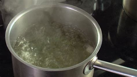 You should generally use water that is around 160 f, which is when tiny bubbles (about 3 mm each) form on the bottom of a pot of water on the stove. A Pot Of Boiling Water On The Stove (rapid Boil With Steam ...