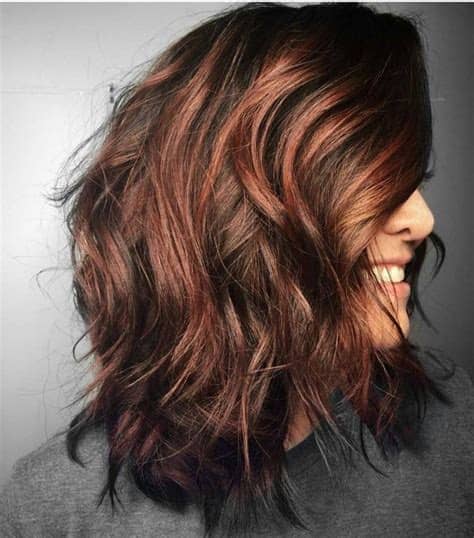 Rather than dying hair darker and adding highlights, the look is best for those who already have brown hair. Tousled Curls with Radiant Auburn Highlights | Hair color ...