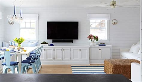 Even china cabinets make fantastic living room cabinets, especially in larger living rooms. Beach Bungalow living Room with White Built In TV Cabinets ...