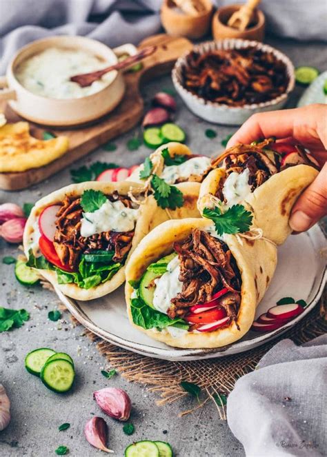 Vegan Gyros With Pulled Mushrooms Vegetables And Tzatziki Sauce