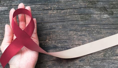 Head And Neck Cancer Awareness With Burgundy Ivory Color Ribbon On