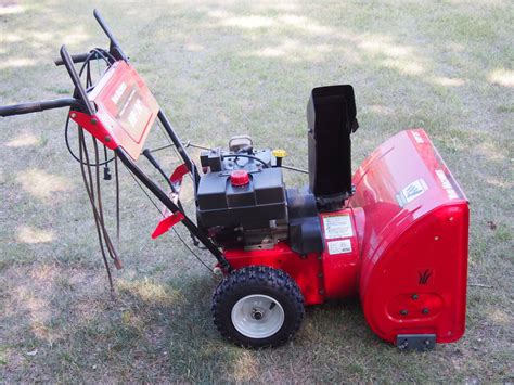 Clearing width and 23 in. MTD 8HP 24" Snowblower W/ Electric Start
