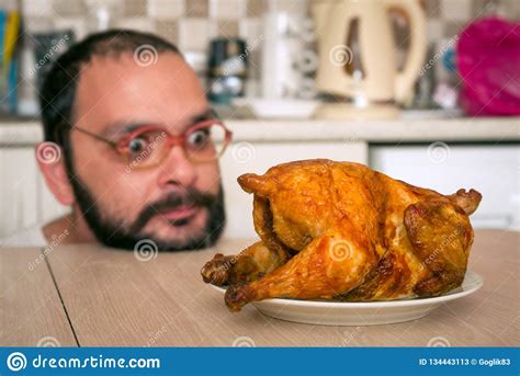 Funny Hungry Man Looking On Chicken Stock Image - Image of delicious ...
