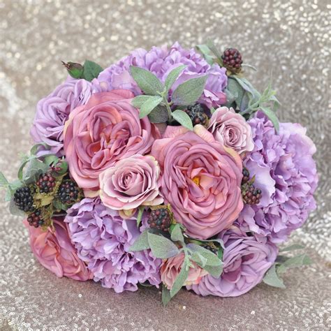 They are basically the flowers which need to be arranged in floral arrangements according to your preferences and choices, or according to the theme of the wedding. Bridal Bouquet with Purple Roses, Purple Peonies, Berry ...
