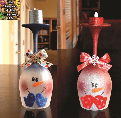 You can add any florals you would like. Snowman Wine Glass Candle Holder