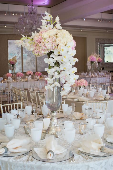 Tall Cascading Orchid Centerpieces | Orchid centerpieces, Orchid centerpieces wedding, Pink ...