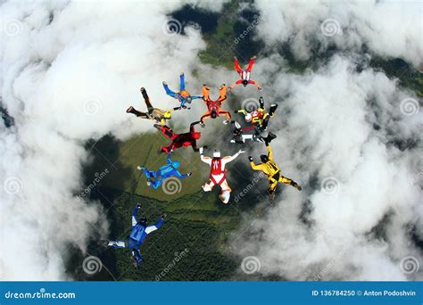 Skydivers Are Doing A Formation In The Clouds Stock Photo Image Of