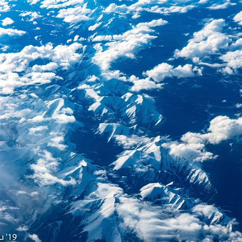 Download Wallpaper 2780x2780 Mountains Clouds Aerial View Height