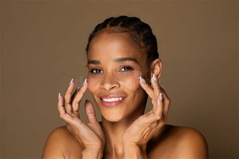 Beauty Face Happy Black Middle Aged Woman Touching Healthy Skin And Smiling Female With Fresh