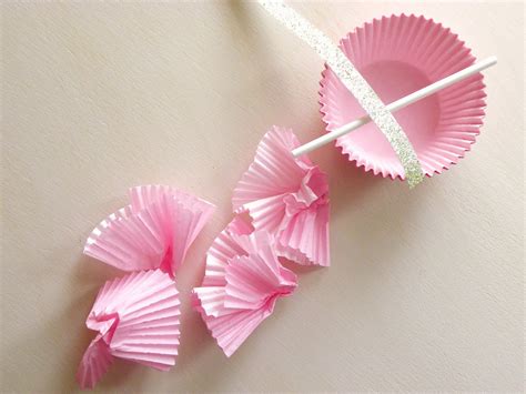 It's so easy and looks perfect for any. Icing Designs: DIY Cupcake liner flower toppers!