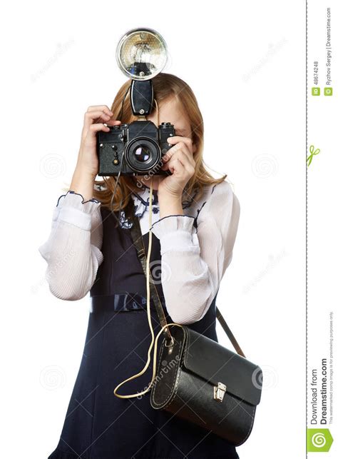Girl Reporter Photographer With Retro Camera And Flash Stock Photo