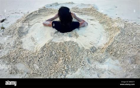 Buried Sand Woman Hi Res Stock Photography And Images Alamy