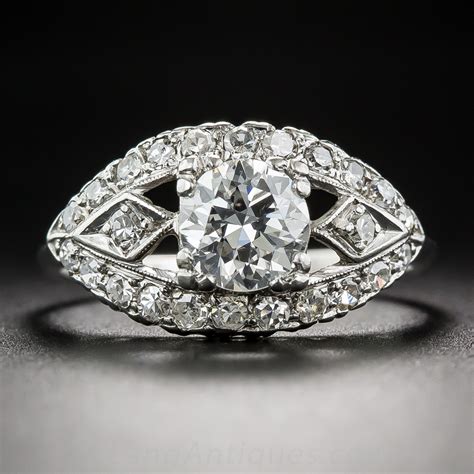 Our collection also includes rare gold victorian era, georgian era, and retro engagement rings. .90 Carat Vintage Diamond Engagement Ring, Circa 1950's