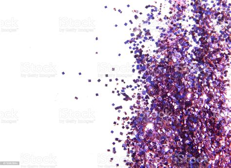 Purple Glitter Sparkles On White Background Stock Photo