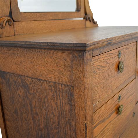 Recessed pulls and tapered legs accented in gold. 60% OFF - Antique Tall Dresser with Mirror / Storage