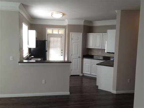 It is very easy to clean and not get any stains. Kitchen with granite counter tops and stainless steel ...
