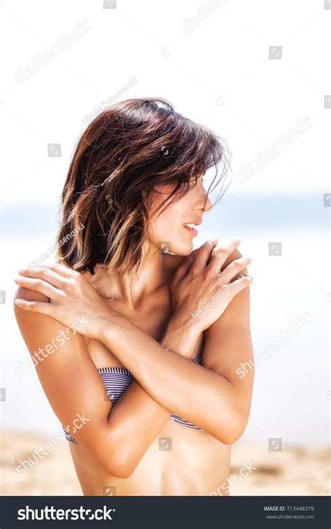 Sexy Girl Bikini Sunbathing On Beach Shutterstock