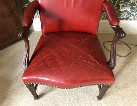 Leather will lighten and soften with both use and time. Red Leather Desk Armchair with Nailhead Trim • The Local Vault