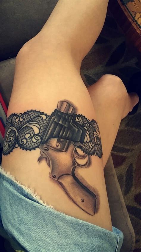 Gun In Garter Tattoos For Women