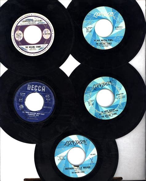 Five classic 45 rpm records by The Rolling Stones including 'Time Is On My Side' and two ...
