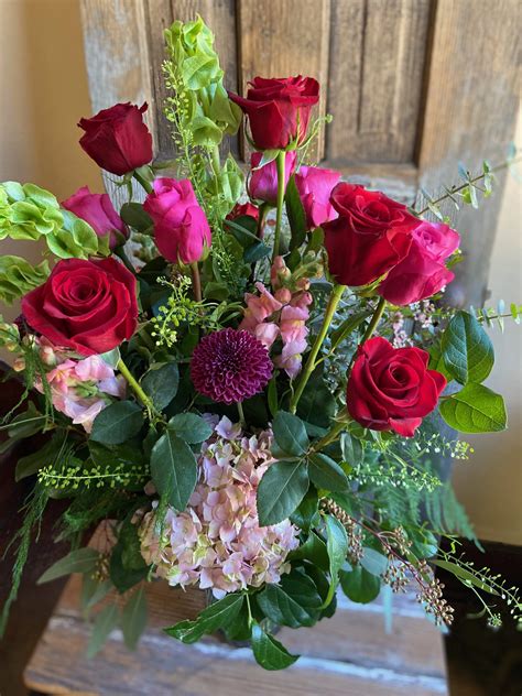 Deluxe Dozen Roses With Mixed Flowers Bouquet Uptown Florist