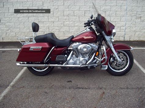 Our 2008 harley davidson electra glide shown off in a custom black with blue flames. 2008 Harley Davidson Flht Electra Glide Um90832d