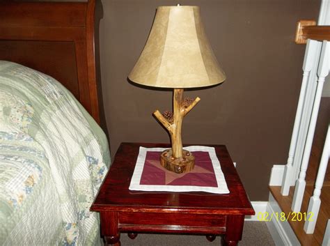 From the kitchen to the bedroom, your home's lighting sets the tone for the house. Dave made a log cabin lamp!! | Cabin lamps, Lamp, Home decor