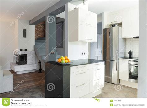 Open Kitchen and Drawing Room Stock Image - Image of brick, modern