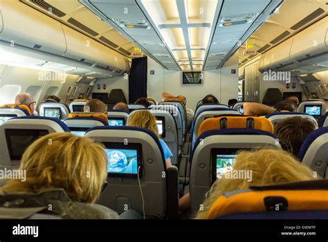 Inside Views Passengers Sitting In Lufthansa Airbus 340 Airplane